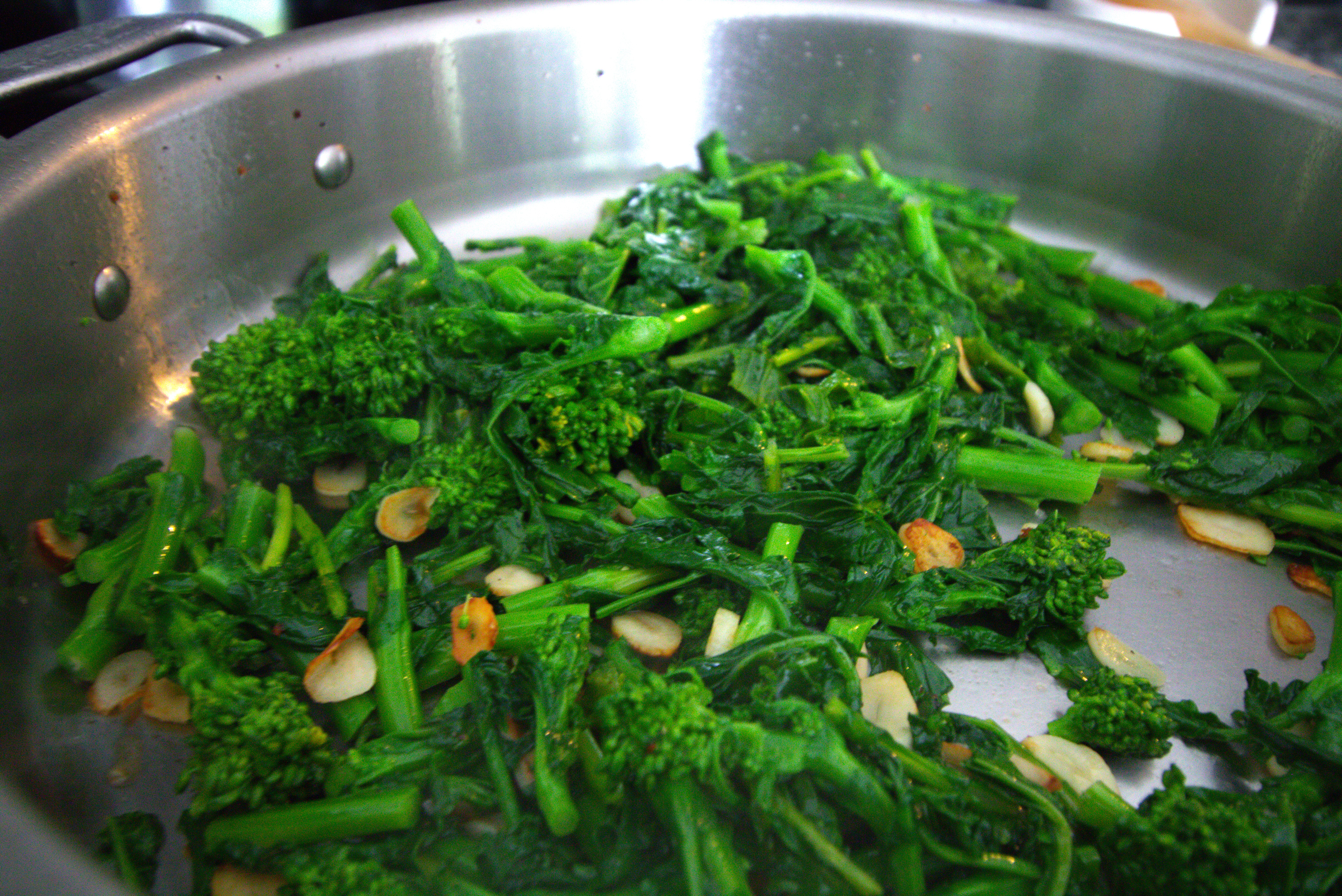 broccoli rabe in pan with garlic