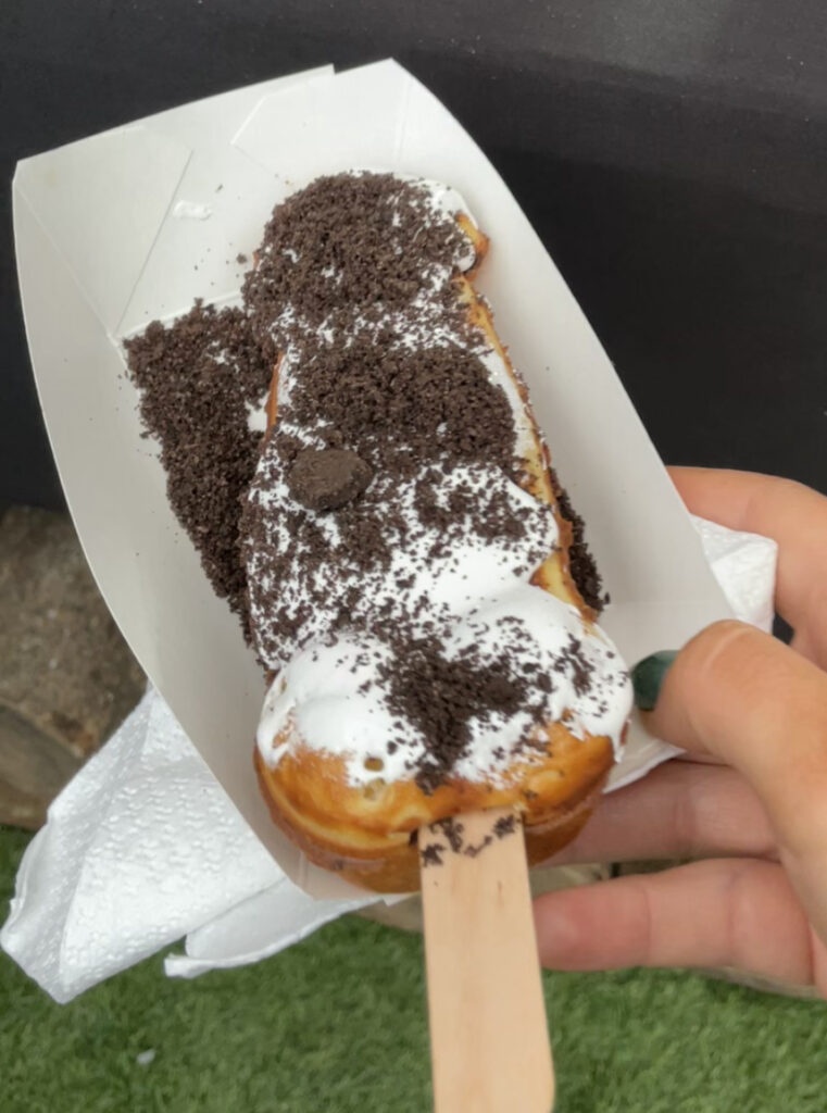 waffle shaped like a penis with marshmallow fluff and crush oreos on top